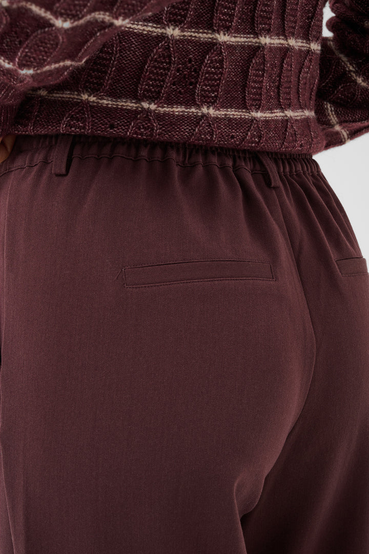 Pantalon Valley pants - Le pantalon long ajusté à taille haute en tissu extensible fluide