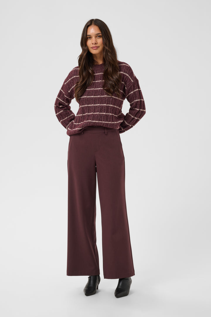 Pantalon Valley pants - Le pantalon long ajusté à taille haute en tissu extensible fluide