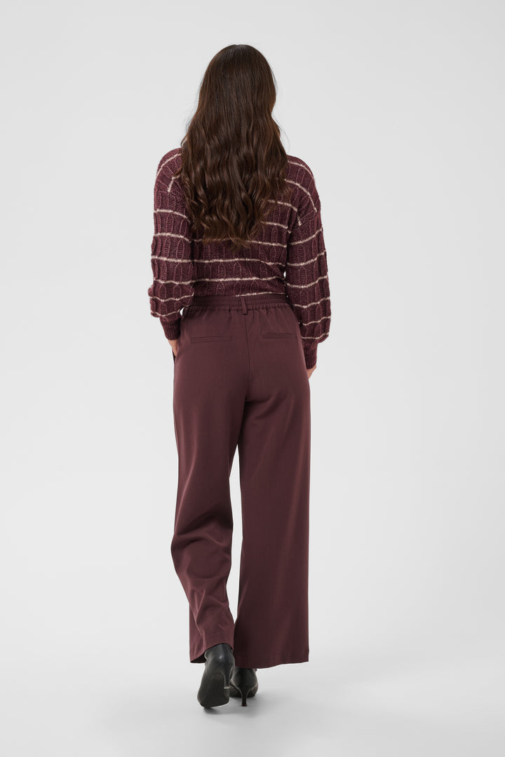 Pantalon Valley pants - Le pantalon long ajusté à taille haute en tissu extensible fluide