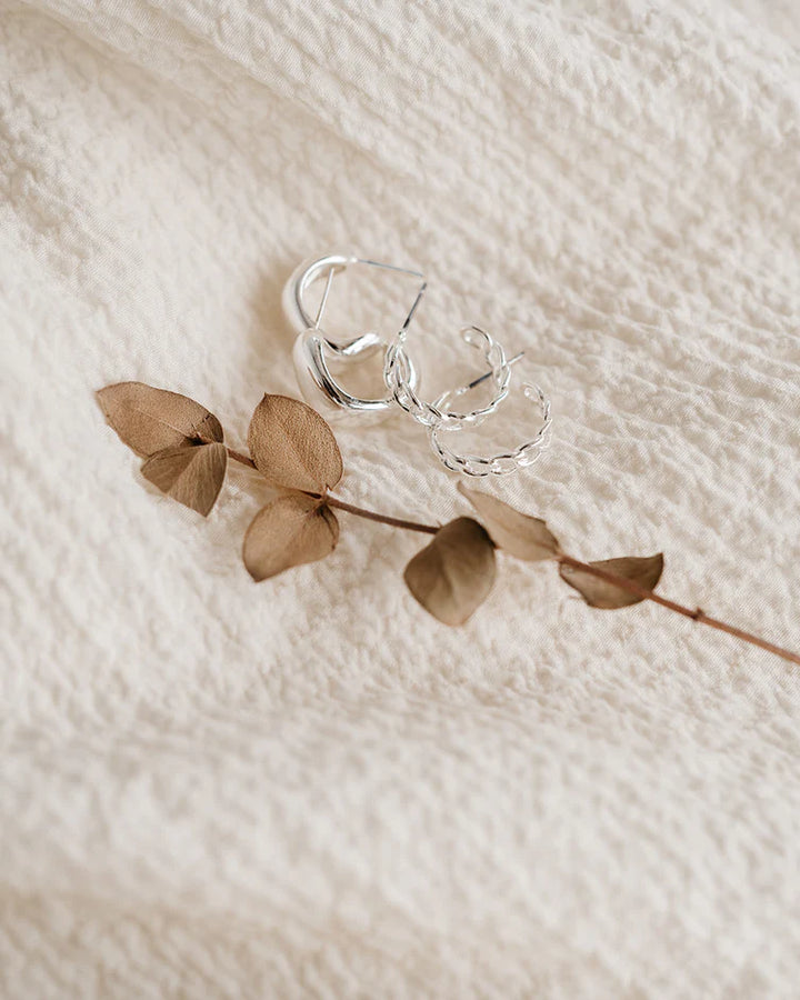 Boucles d'oreilles anneaux bombés argentés Manon - En acier inoxydable