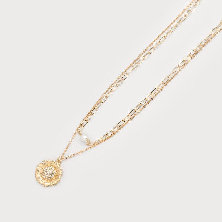 Collier deux rangs avec fleur et perle