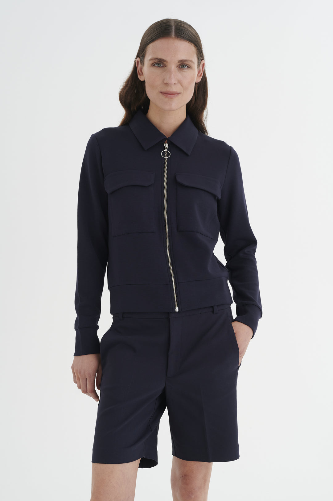 Veste avec fermeture éclair et anneau rond