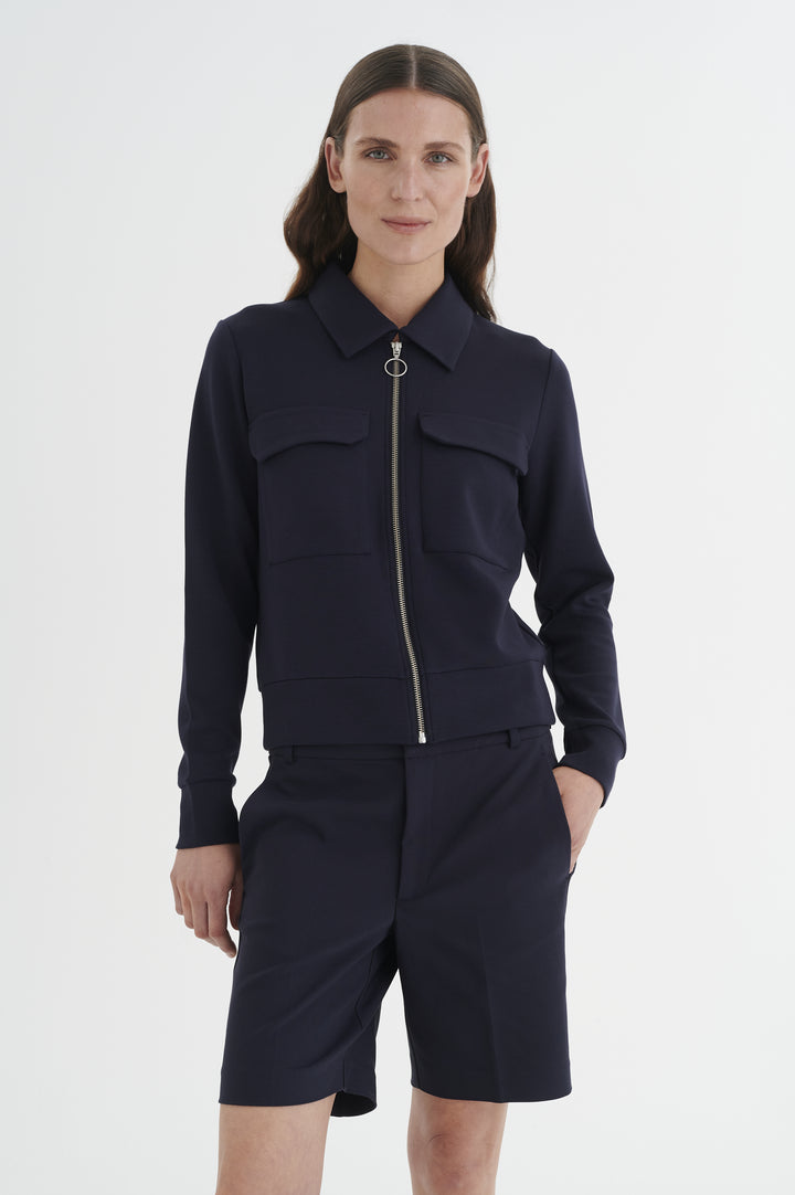 Veste avec fermeture éclair et anneau rond