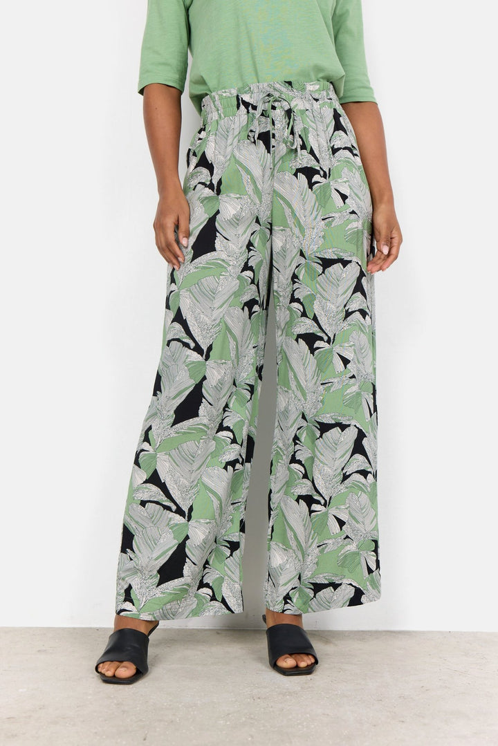 Pantalon en toile avec imprimé de feuilles de palmier