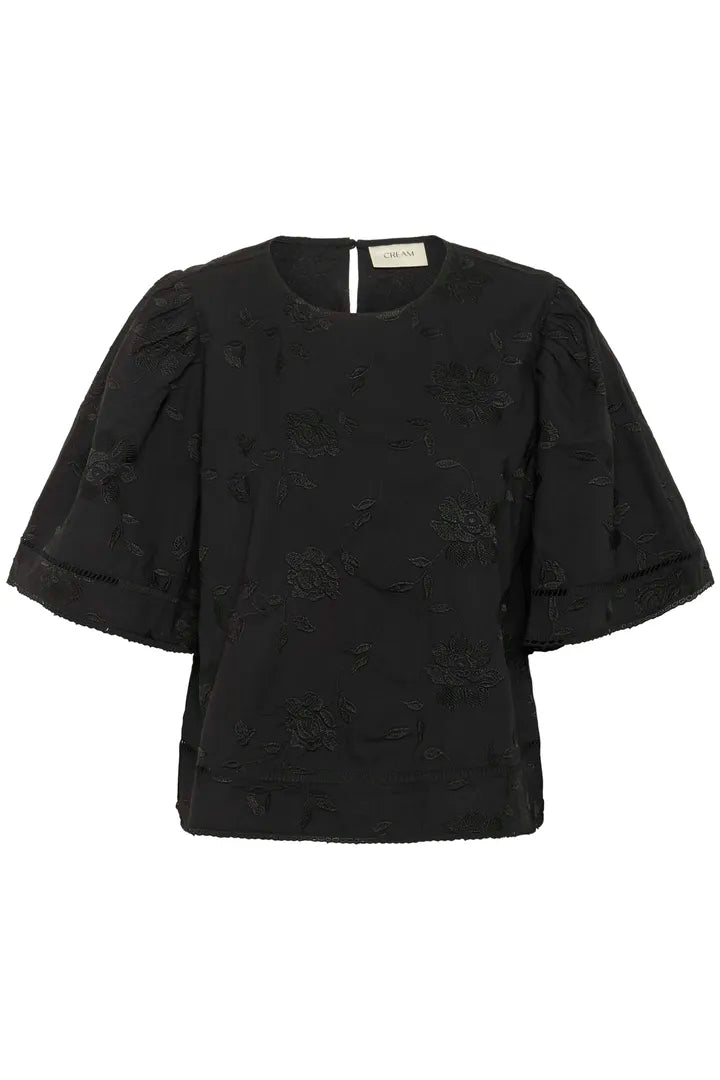 Blouse à motif floral brodé, dans un jeu de ton sur ton Anais