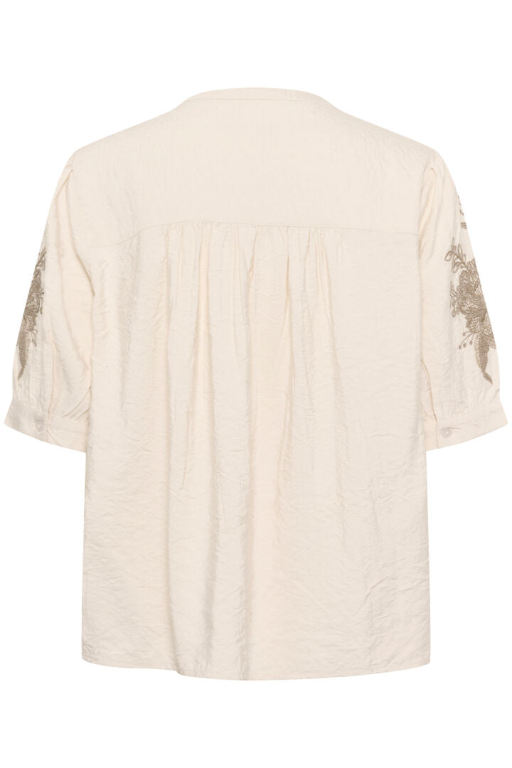 Blouse avec bouquet de fleurs brodé aux épaules June