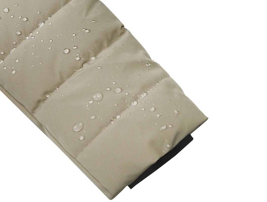 Manteau matelassé à capuche Haukkala - Coupe ajustée et mi-longue
