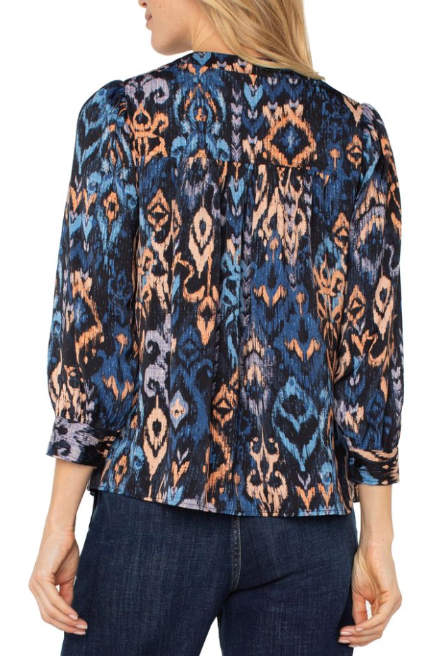 Blouse fluide et volumineuse aux teintes complémentaires