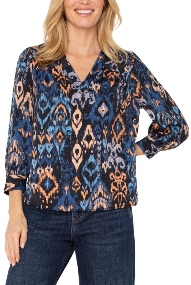 Blouse fluide et volumineuse aux teintes complémentaires