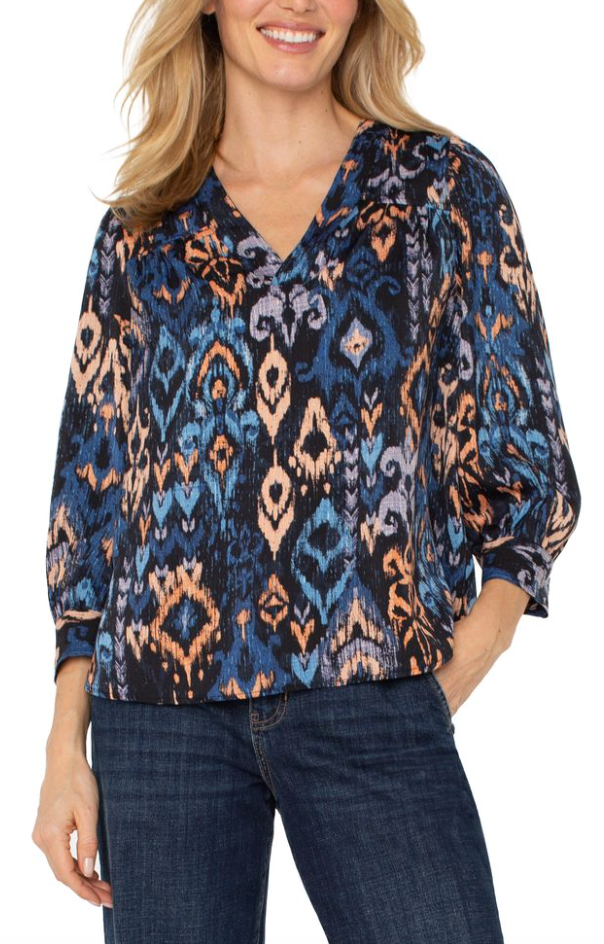 Blouse fluide et volumineuse aux teintes complémentaires