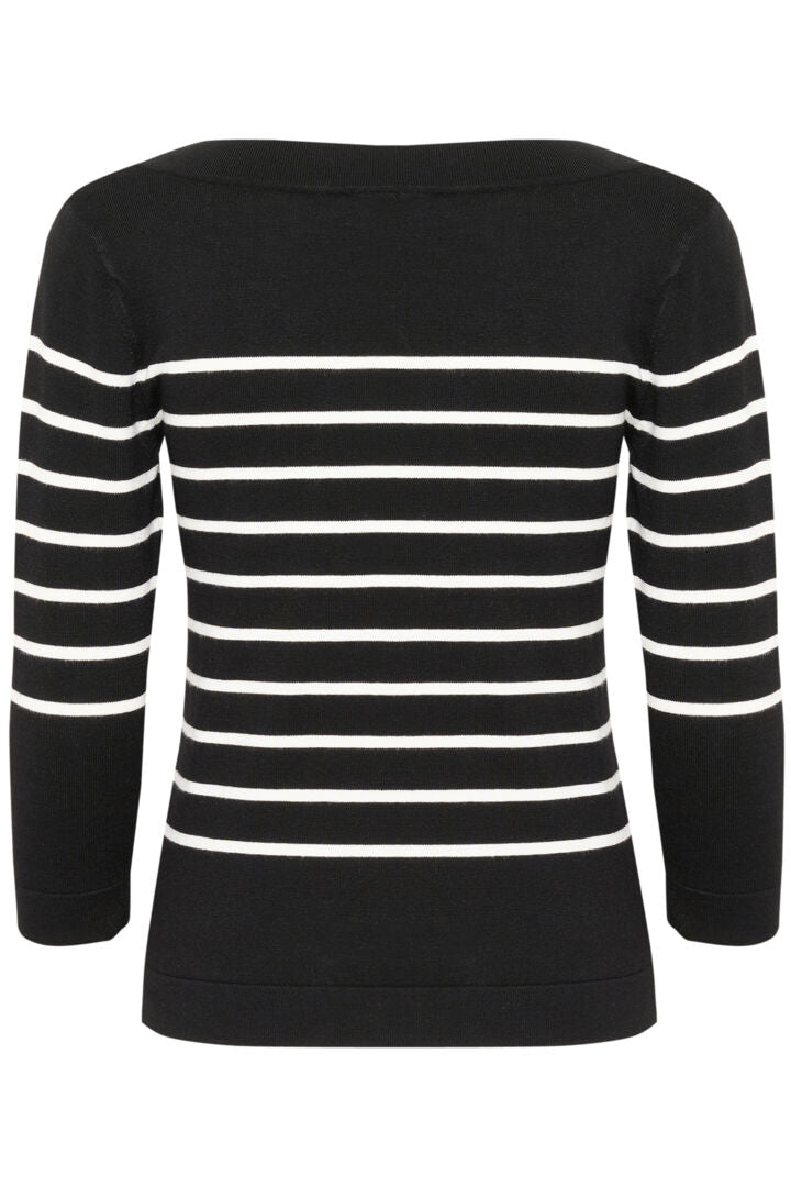 Chandail à col bateau, qui dévoile subtilement la ligne des épaules Lizza