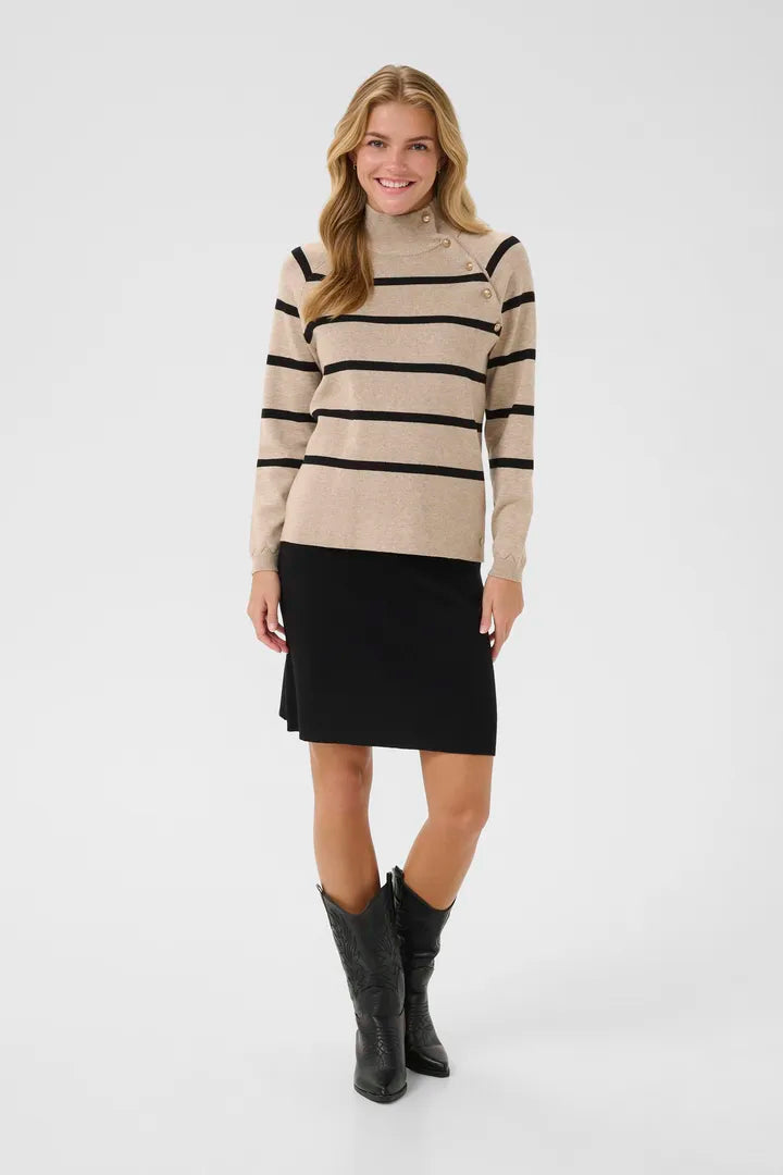 Chandail asymétrique avec boutons sur l’épaule Dela