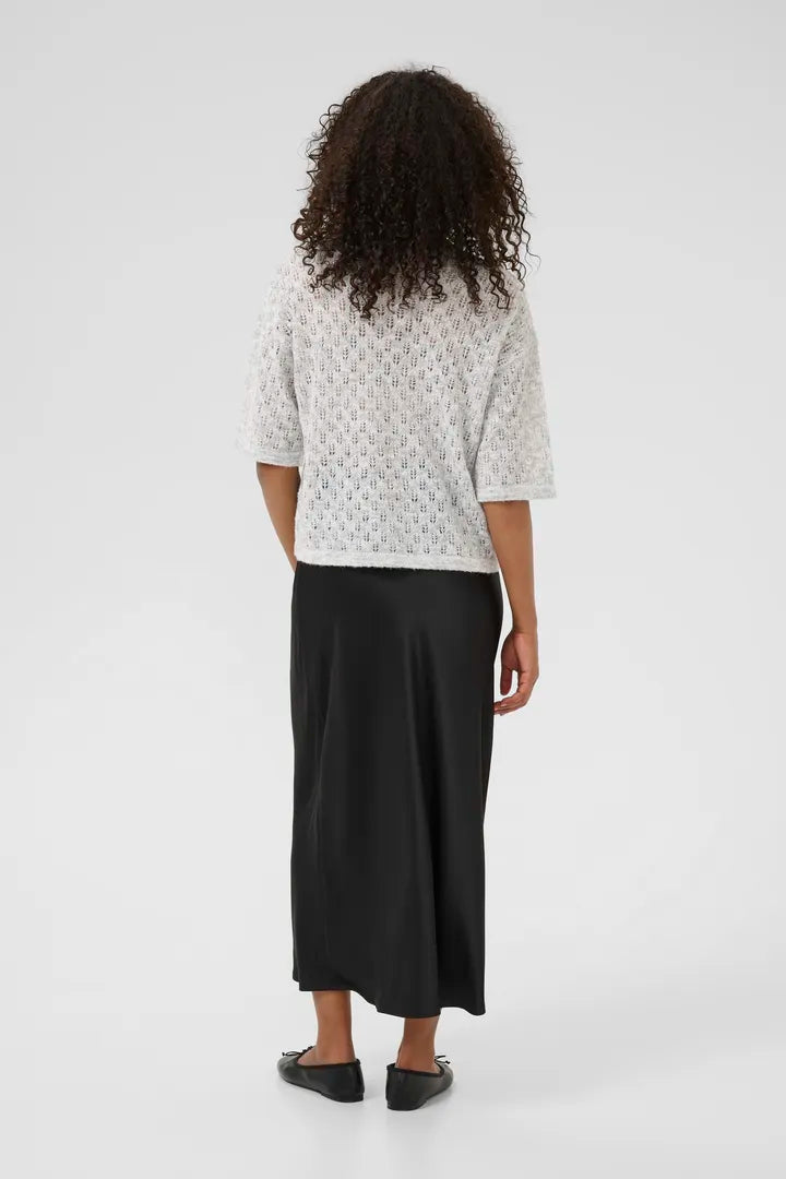 Chandail en maille texturée évoquant la forme d’épis de blé Lourine