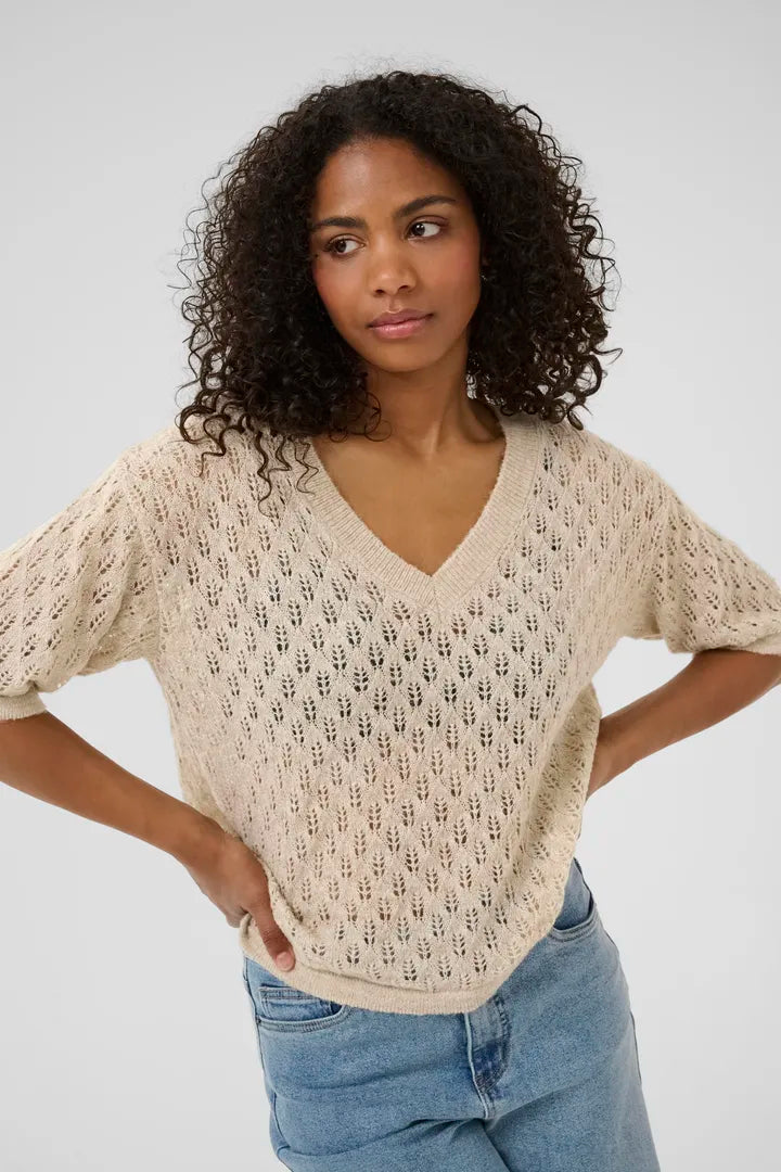 Chandail en maille texturée évoquant la forme d’épis de blé Lourine