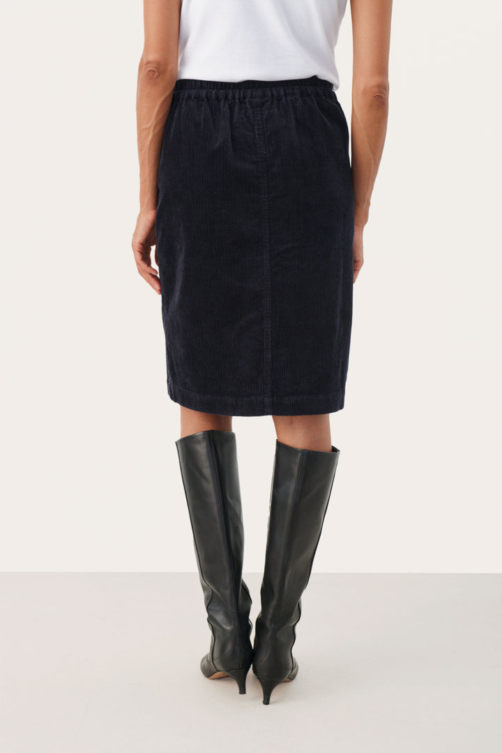 Jupe à boutons décoratifs