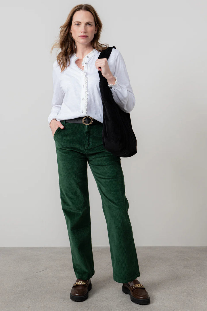 Blouse en coton bio à col volanté et broderie