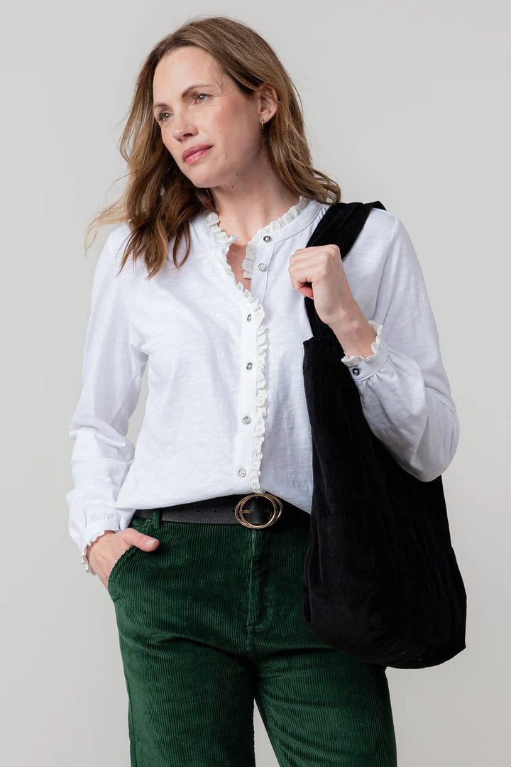 Blouse en coton bio à col volanté et broderie