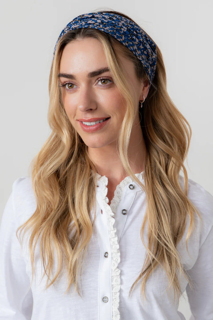 Blouse en coton bio à col volanté et broderie