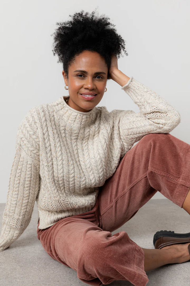 Pull à col montant en maille torsadée