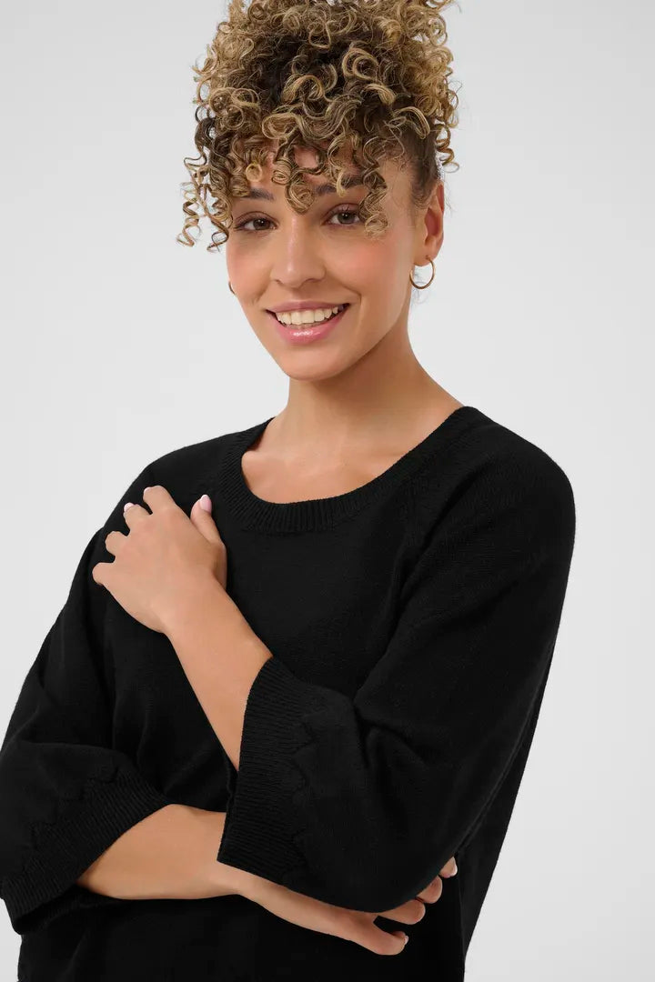 Pull avec détails en v et manches 3/4 Dela