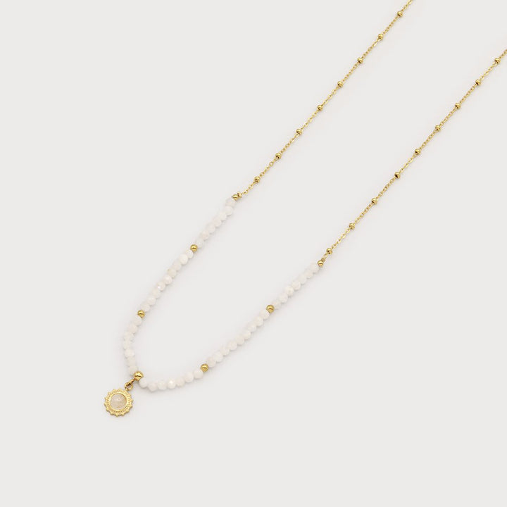 Collier à petites perles naturelles - Médaillon soleil