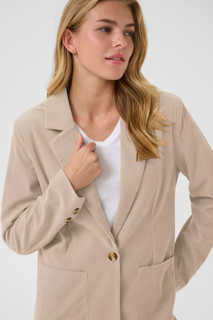 Veston en velours côtelé texturé, dans deux tons chaleureux Kanna