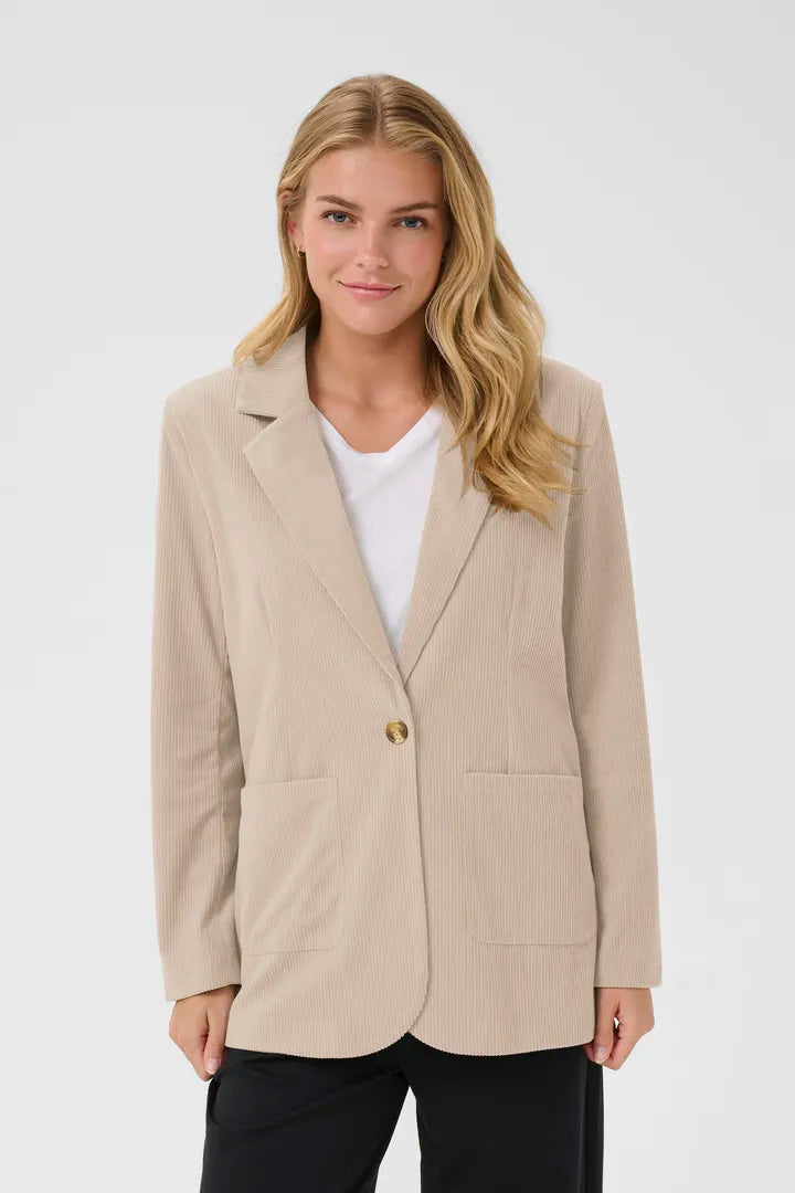 Veston en velours côtelé texturé, dans deux tons chaleureux Kanna