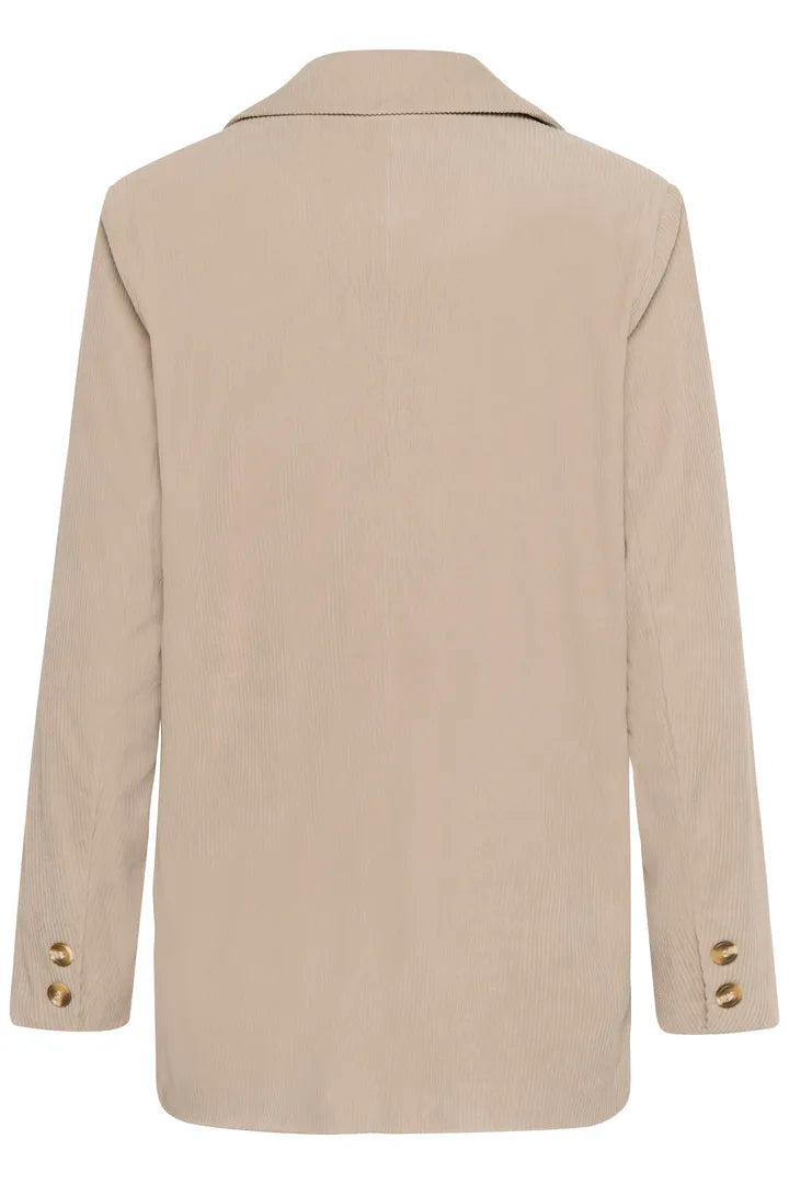 Veston en velours côtelé texturé, dans deux tons chaleureux Kanna