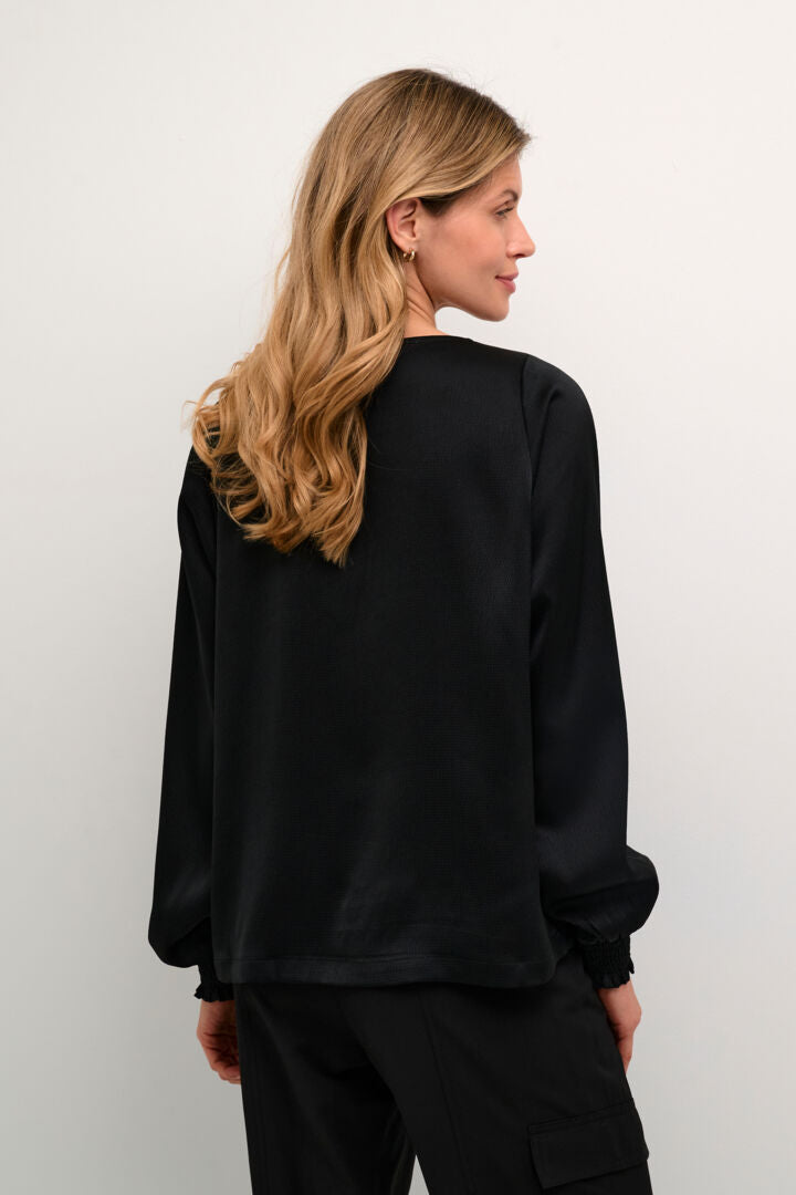 Blouse fini satiné col rond