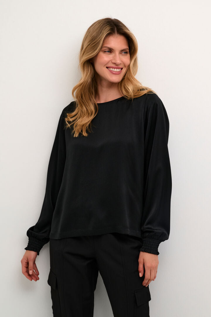 Blouse fini satiné col rond