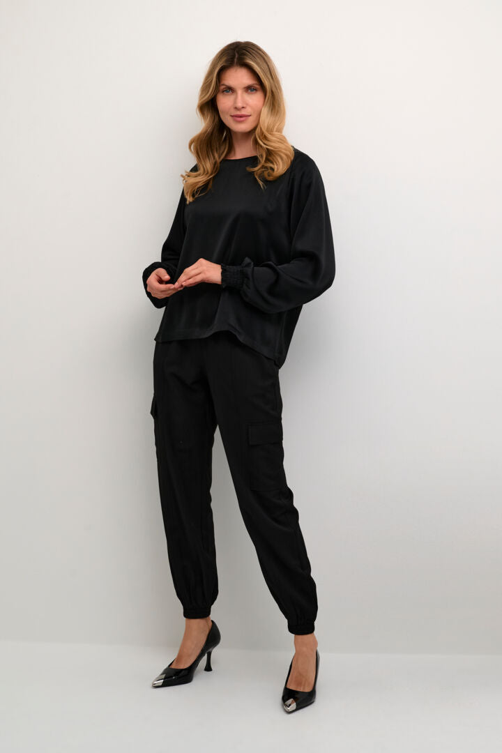 Blouse fini satiné col rond