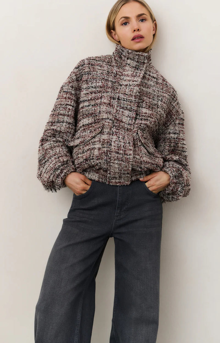 Veste à franges et col montant