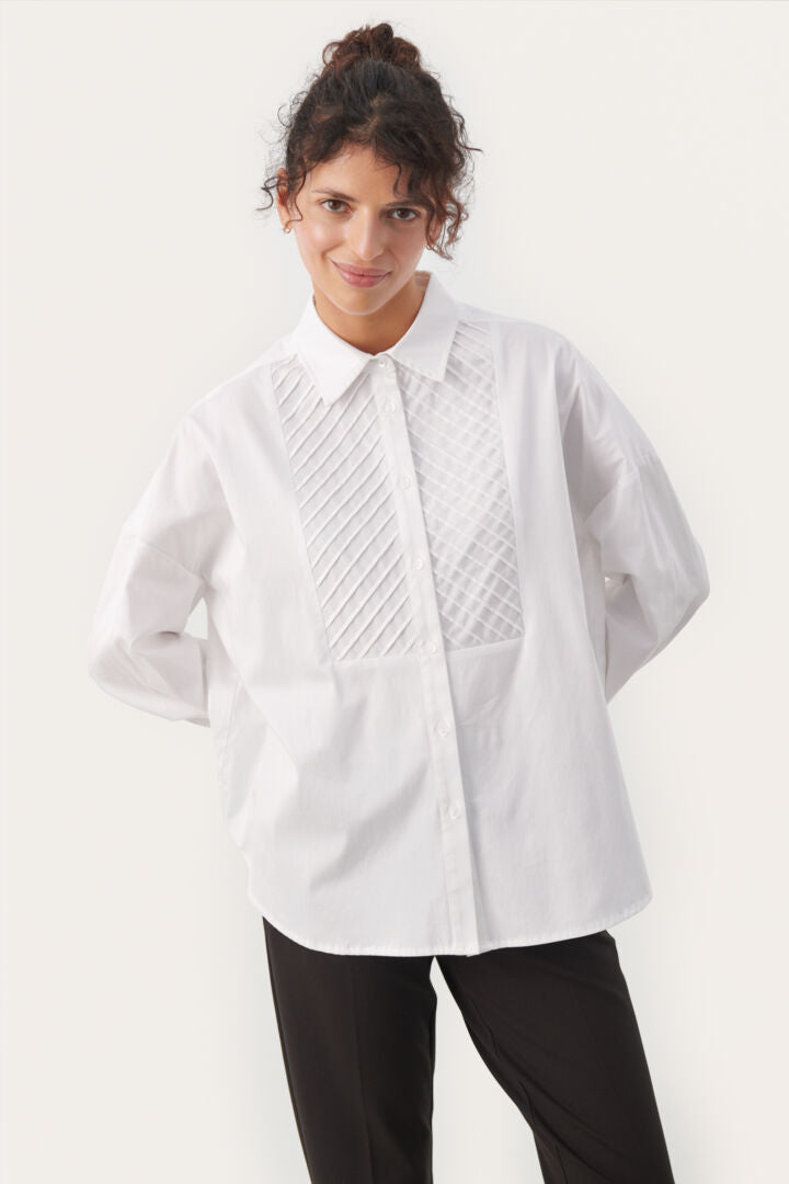 Chemise blanche à bavette texturée