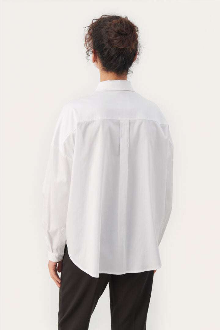 Chemise blanche à bavette texturée