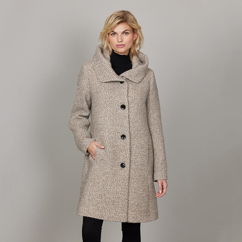 Manteau col haut en laine bouclée