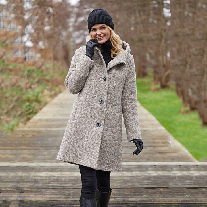 Manteau col haut en laine bouclée