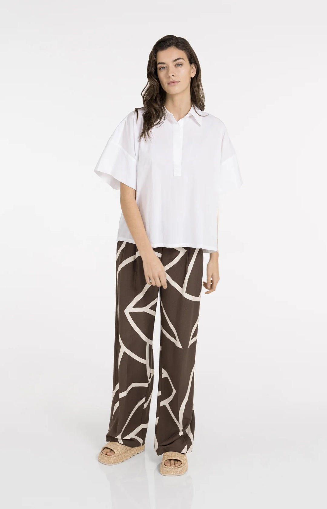 Pantalon fluide imprimé à jambes larges - Avec taille haute et look graphique