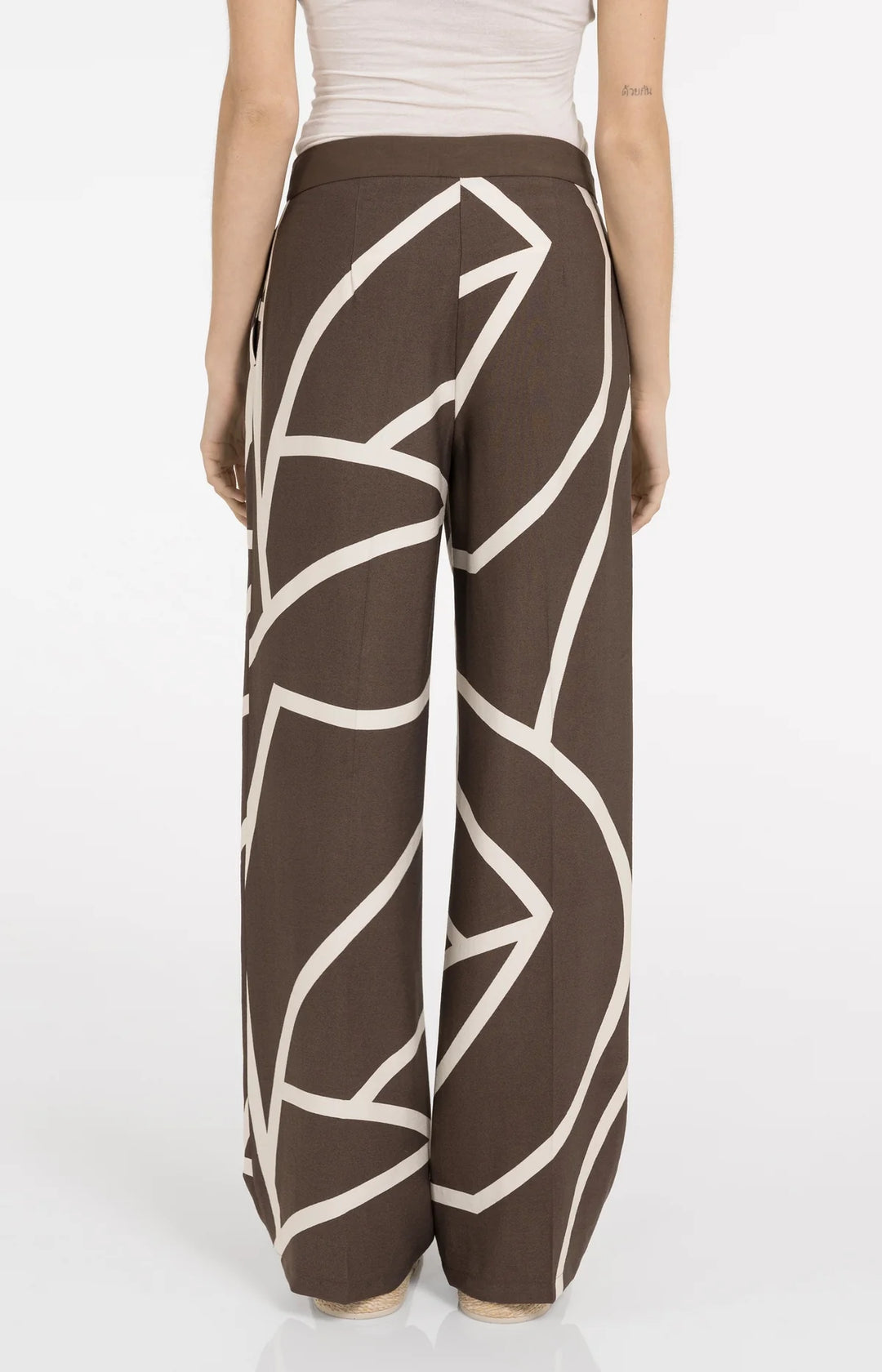 Pantalon fluide imprimé à jambes larges - Avec taille haute et look graphique