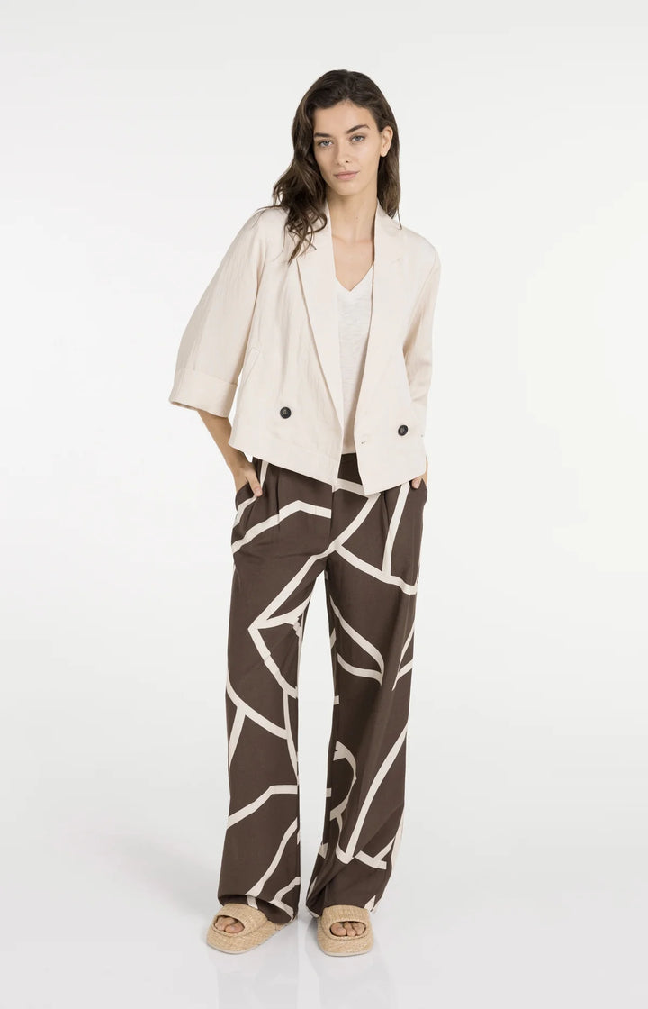 Pantalon fluide imprimé à jambes larges - Avec taille haute et look graphique